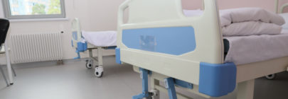 Hospital beds with lifting mechanism