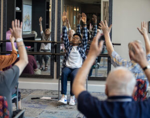 Charity Hammond leading an exercise class at The Providence